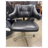 Vintage Mid-Century Modern swivel armchair