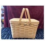 Handwoven Longaberger basket features a