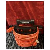 Orange extension cord With husky holder