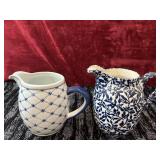 2 Blue and White Ceramic Pitchers.