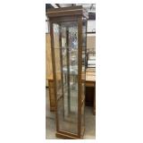 Oak lighted curio cabinet with etched glass panels