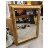 Rectangular mirror in ornate frame