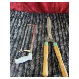 Hedge shears and Hacksaw