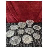 Bundle of clear pressed glass dishes and bowl