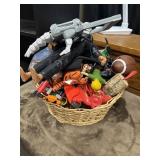 Basket full of boys toys.