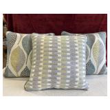 Bundle of decorative pillows.
