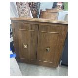 Brown hardwood storage cabinet