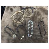 6 Handmade bracelets.