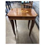 Vintage Italian side table features intricate