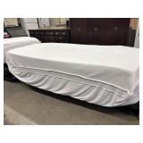 Adjusting twin bed frame and mattress.