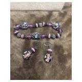 Artisanal purple lamp work glass bead jewelry
