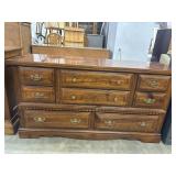 Vintage Sumter Cabinet triple dresser features a
