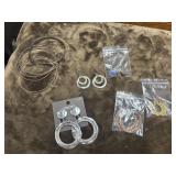 Chicos costume earrings and bangles.