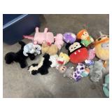 Tote full of stuffed plushy toy animals.