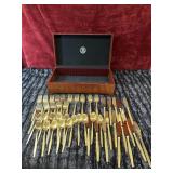 15pc place setting of Golden Bouque Sliver ware.