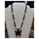 Starfish glass pendant necklace and earrings.
