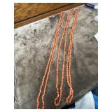 Unpolished, raw orange gemstone Necklaces.