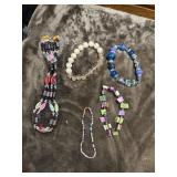 Bundle of beaded bracelets.