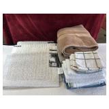 Towels, bath mats, kitchen towels and dish rags.