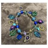 Multicolored charm bracelet.