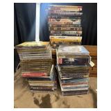 Bundle of dvds and cds.