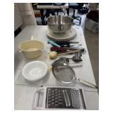 Variety of kitchen items stacked together,