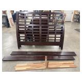 Mission-style full size wood sleigh bed, in a