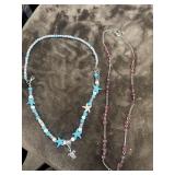 Blue and silver-colored beaded necklace, pink