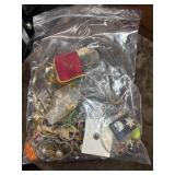 Bag full of pieces and parts for jewelry making.