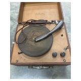 Vintage Silvertone suitcase-style record player.