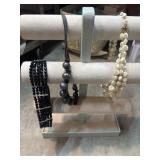 Vintage-style multi-strand necklace features