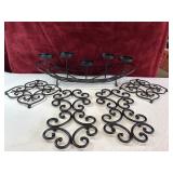 Iron candle holder centerpiece and sconces.