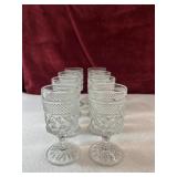 Diamond cut stemmed glasses.