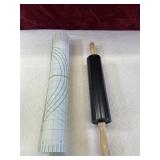 Roller pin and baking mat.
