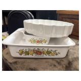 Vintage Corning Ware casserole dishes.