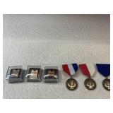 Promise" pins, and band medals .