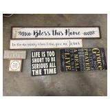 Collection of several decorative wooden signs