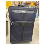 3 piece set navy blue Dockers carry-on suitcases.