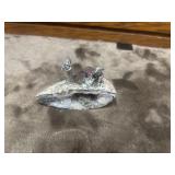 Decorative diorama featuring pewter miner