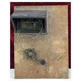 Antique magneto generator ringer box.