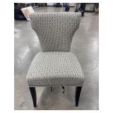Stylish accent chair features a grey and white