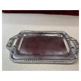 Apples Annieï¿½s silver-plated serving tray.