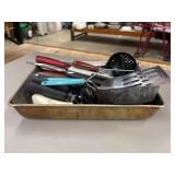Bundle of miscellaneous kitchen utensils.