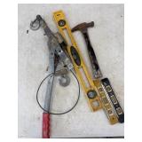 Cable winch puller, levels, and Hammer.