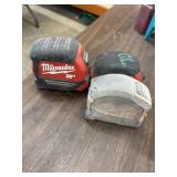 2 Milwaukee measuring tapes 25ft and 1 35ft.