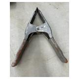 Metal spring clamp.