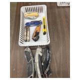 Bundle of various utility knives and cutters