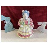 Ceramic bunny cookie jar and metal bunnies.