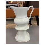 White porcelain pitcher and pedestal.