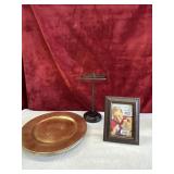 Charger plates, picture frame and towel holder.